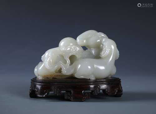 A White Jade Carved Three Rams