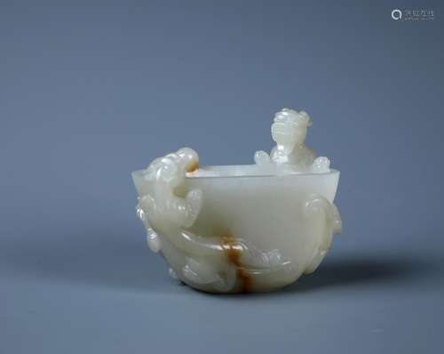 A Finely Carved Chinese  Jade Archaic-style Dragon Bowl