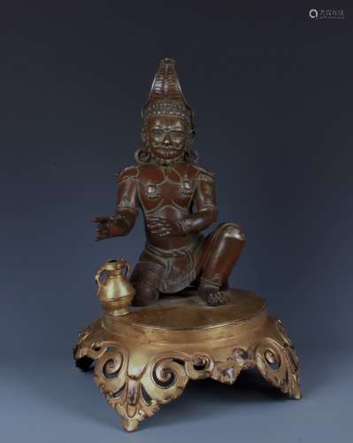 RARE SILVER FIGURE OFGARDIAN WITH GILT BRONZE STAND