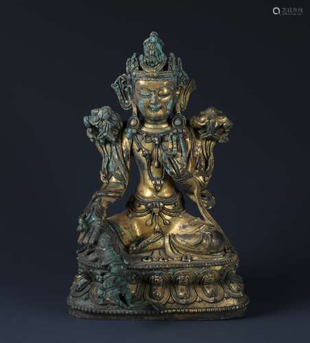 A SMALL GILT BRONZE FIGURE OF GREEN TARA