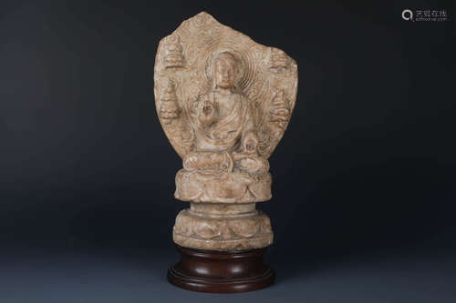 A FINELY CARVED CHINESE WHITE STONE SAKYAMUNI