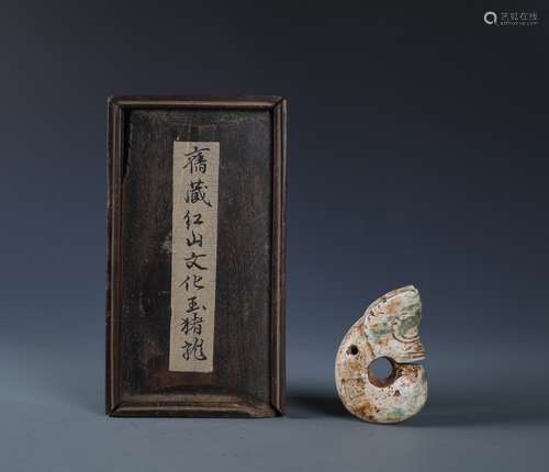 A VERY RARE CARVED JADE ZOIAC ORNAMENT WITH WOOD BOX