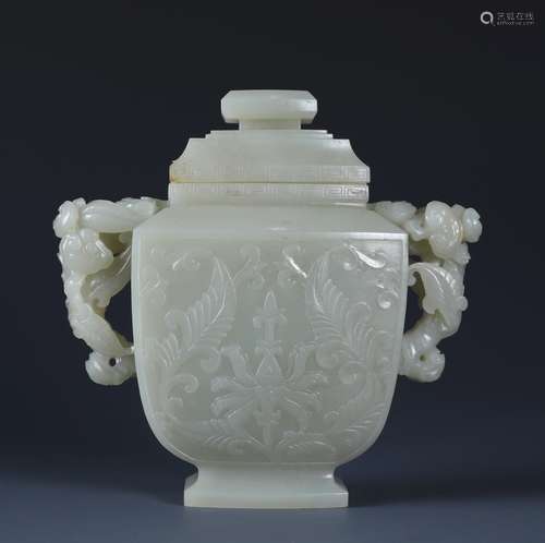 A CARVED  CHINESE WHITE JADE VASE OF PASSIONFLOWER