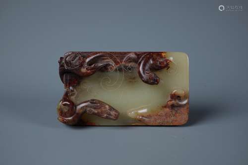 A CHINESE WHITE AND RUSSET JADE 'CHILONG'PENDENT PLAQUE