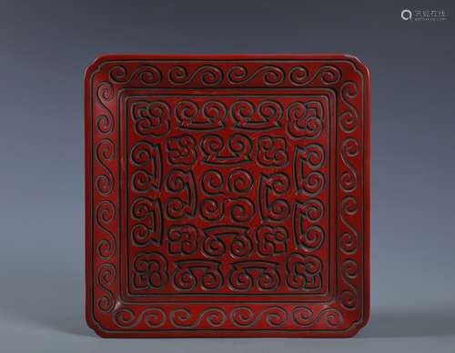 A RARE CINNABAR TIXI LACQUER SQUARE FOOTED DISH