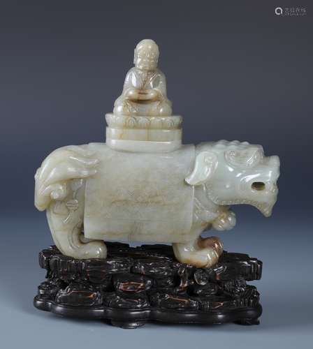 A FINELY CARVED WHITE AND RUSSET JADE INCENSE BURNER