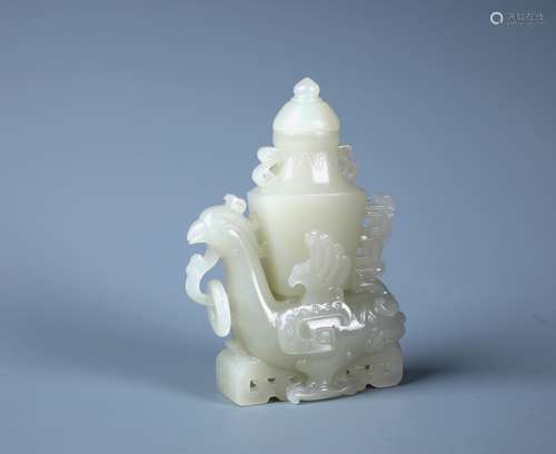 A FINELY CARVED CHINESE WHITE JADE 'PHOENIX' VASE