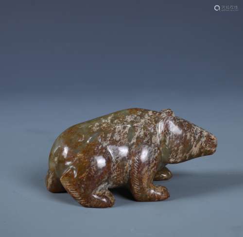 A Celadon And Cream-Russet Jade Figure Of Bear