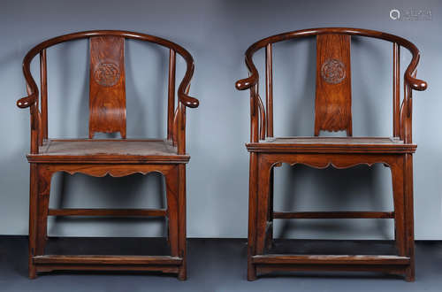 A PAIR OF HUANGHUALI HORSESHOE-BACK ARMCHAIRS