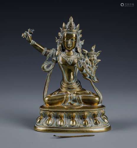 A FINELY CAST POLISHED BRONZE FIGURE OF MANJUIST