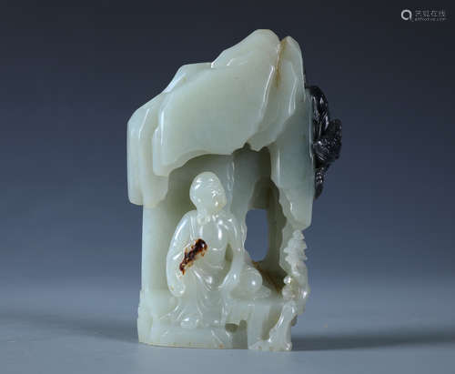 A White and Black Jade Carved Mountain Brush boulder