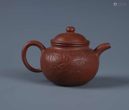 A SMALL CHINESE YINGXING ZISHA TEAPOT