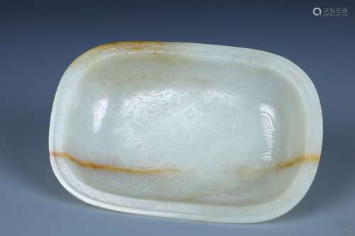 A CARVED CHINESE WHITE JADE TAOTIE MASK OVAL FORM BRUSH