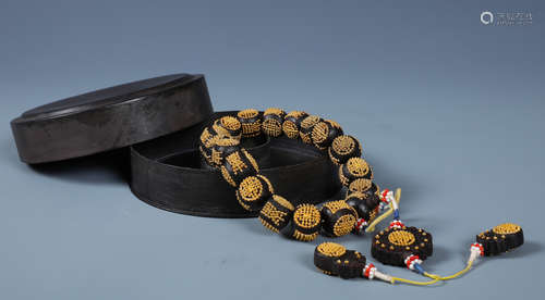 A CHINESE ALOESWOOD  ROSARY  BRACELET  AND MATCHING TIN