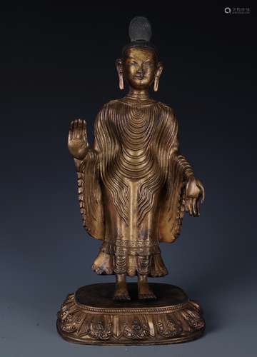 A RARE GILT BRONZE FIGURE OF ACUOYE