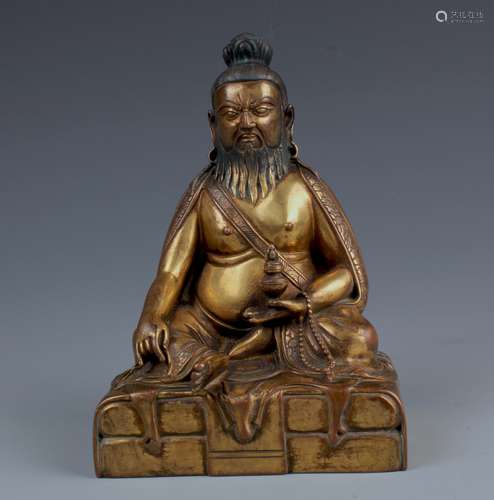 A CHINESE GILT BRONZE FIGURE OF Guru