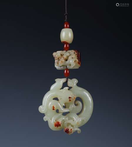 A CARVED CHINESE CELDON AND RUSSET JADE TWIN CHILONG