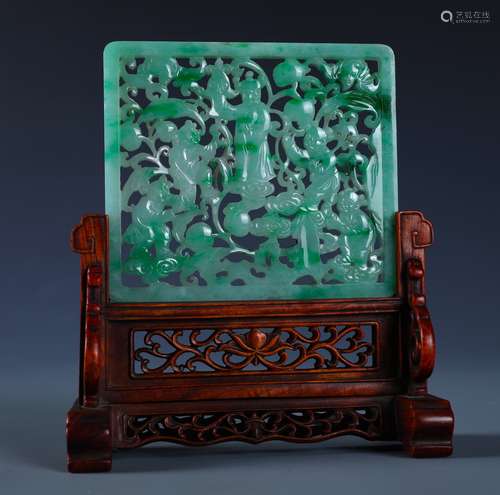 A SMALL CHINESE CARVED AND PIERCED  JADEITE 'BOY AND