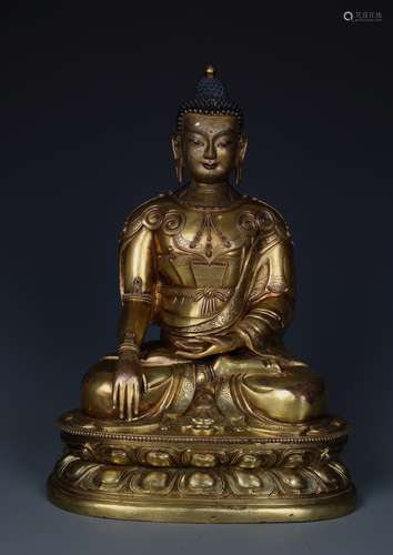 A RARE AND IMPORTANT GILT-BRONZE FIGURE OF BUDDHA