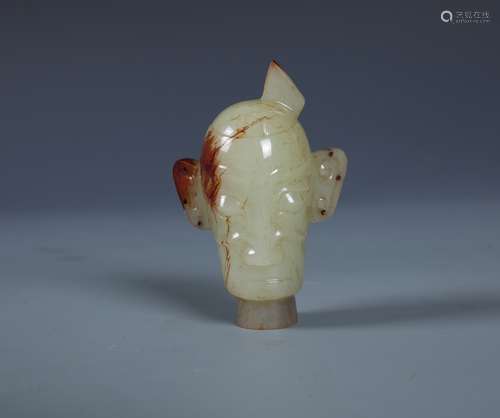 A Russet And White Jade Figurine Ornament