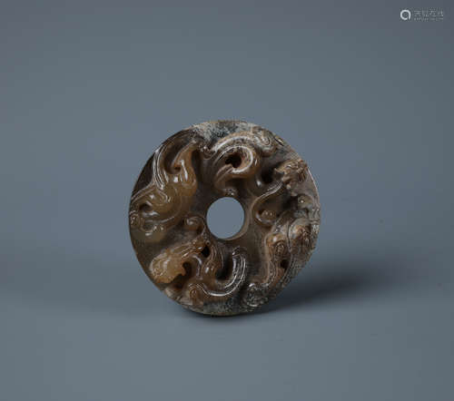 A Finely Carved Grayish-Russet Jade Dragon Circular Bi