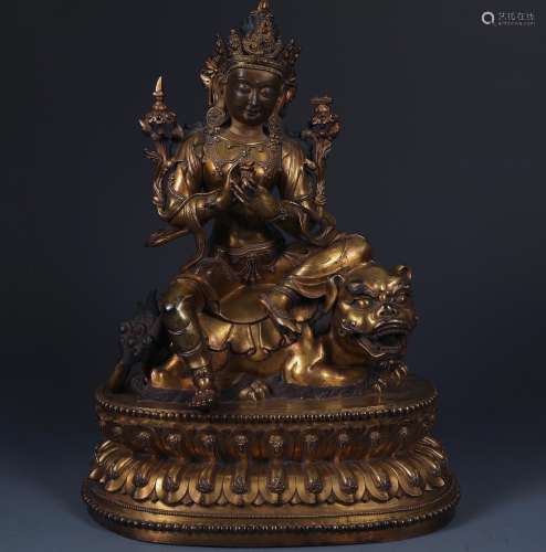 An Exceptional Gilt Bronze Figure of Manjushri Budda