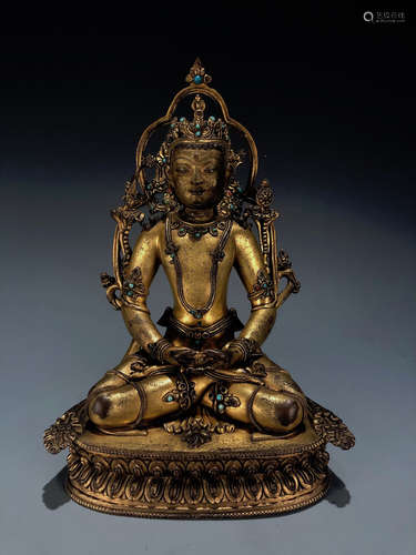 A GILT BRONZE FIGURE OF AMITAYUS