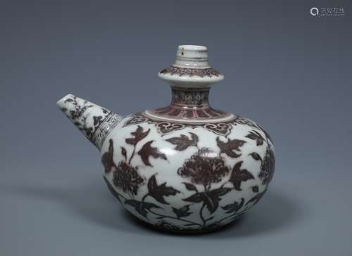 A CHINESE IRON-RED PORCELAIN EWER