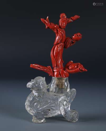 A CHINESE CARVED CORAL LADY WITH PHONEX SHAPED CRYSTAL