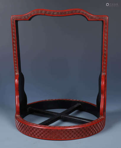 A CARVED CHINESE  CINNABAR LACQUER STACKING RACK