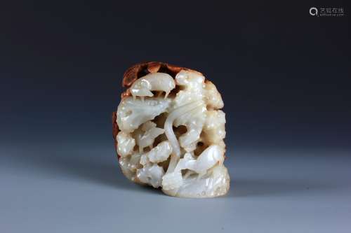 A CARVED CHINESE WHITE AND RUSSET JADE OPENWORK