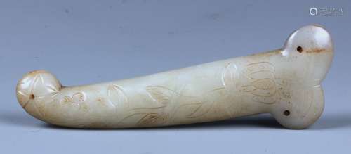 A CHINESE WHITE JADE CARVING OF SWORD HANDLE INCISED