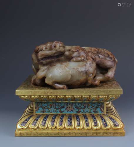 A Celadon Jade Figure of Lions With Gilt Bronze Stand