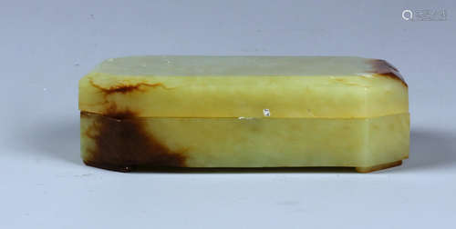 A CHINESE YELLOW AND RUSSET JADE RECTANGULAR FORM BOX