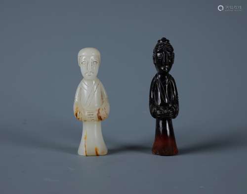 A Pair of Fine Carved White and Black Jade Figurines