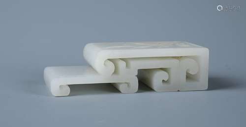 A CARVED CHINESE WHITE JADE ORCHID BRUSH REST