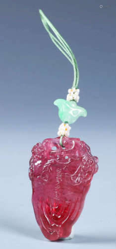 A CHINESE  PINK TOURMALINE CARVED ZHAIJIE PENDENT