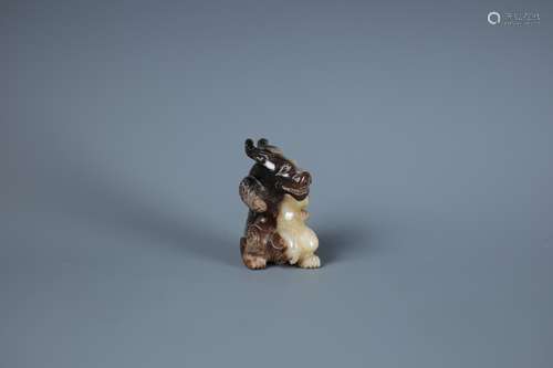 A CHINESE CELDON AND BLACK JADE  BEAR