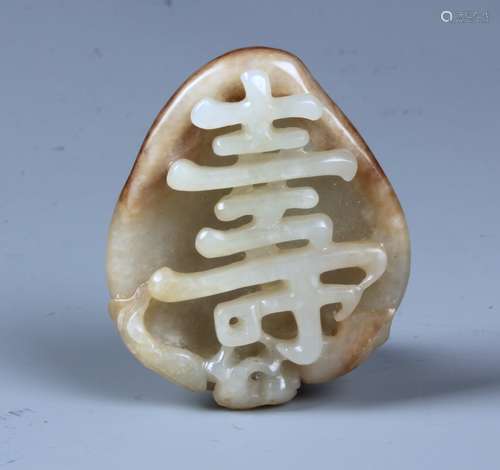 A FINE CHINESE WHITE JADE CARVING OF 'SHOU'