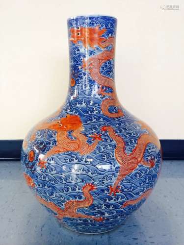 An Extremely Rare and Magnificent Underglazed Blue and Iron Red Dragon Vase