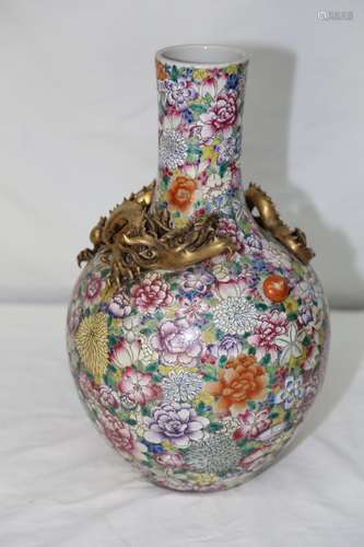 A Famille Rose Decorated Gilt Dragon Vase