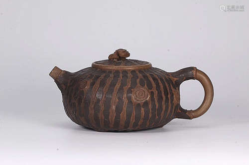 A FRUIT DESIGN PURPLE CLAY TEAPOT