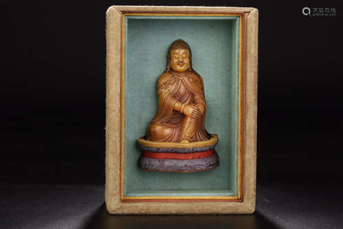 AN OLD BUDDHA DESIGN FIELD YELLOW STONE ORNAMENT