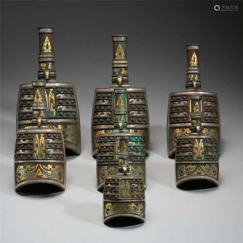 A SET OF SEVEN CHINESE GOLD INLAID BRONZE CHIME