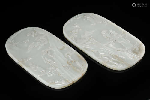PAIR OF CHINESE CELADON JADE CARVED MEN IN MOUNTAIN OVAL PLAQUES