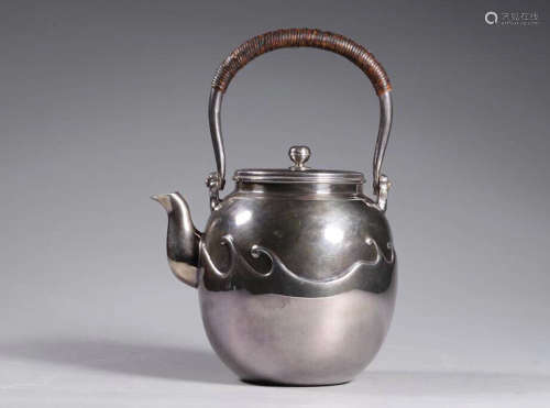 20TH CENTURY, A LOOP-HANDLED SILVER TEAPOT, ZHAOHE PERIOD