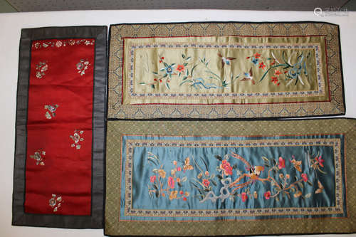 Three Chinese embroidery pieces.