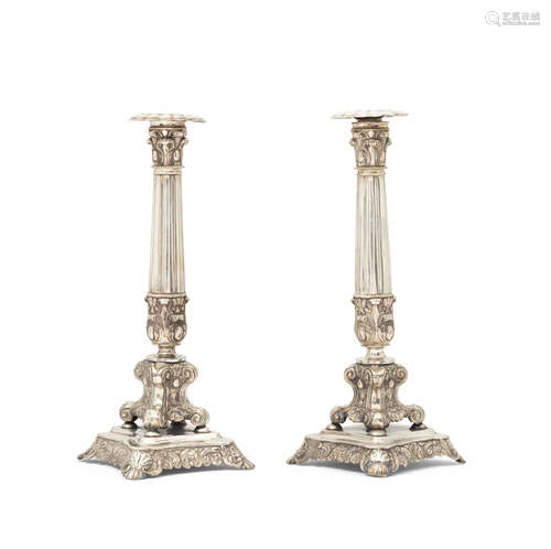 marked only with later French import marks  (2) A pair of 19th century silver candlesticks