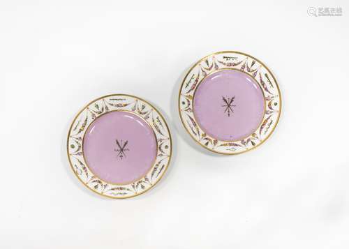 2 A pair of Sèvres dinner plates from the 'Service fond rose guirlande de fleurs et attributs' made for Napoleon I, circa 1805