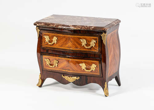 In the Louis XV style MINIATURE FURNITURE - A French 19th century kingwood and rosewood commode